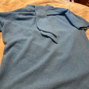 1950’s style blue mid length skirt with matching blouse.